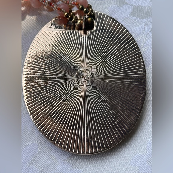 Orange beaded necklace that lands high on chest. - Picture 2 of 3